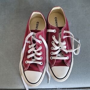 Cherryred low-top Converse sneakers